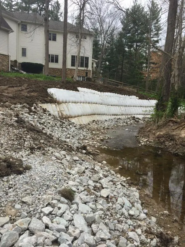 A large pile of snow is on the ground.